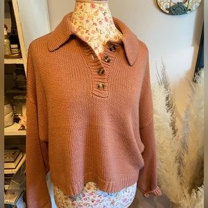 Pink polo sweater, very gently used, size medium